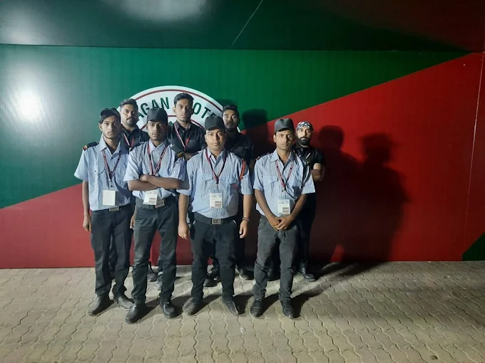 Professional Tiger Security guards team in uniform standing in front of building